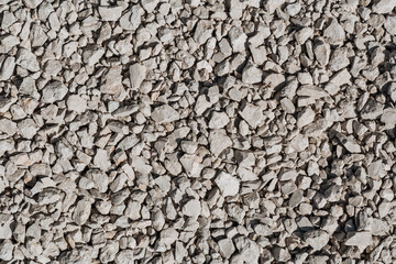 Background of gray crushed stone different forms