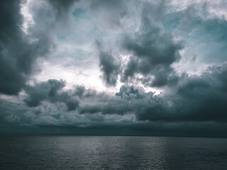 Fototapeta na wymiar storm clouds over lake
