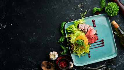 Vegetable salad with veal and pineapple. Top view. Rustic style.