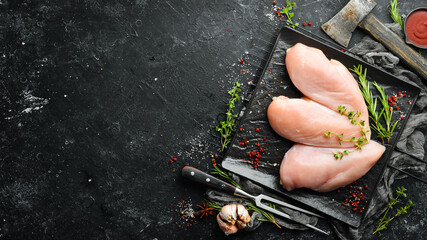 Meat. Raw chicken fillet with spices. Top view. Rustic style. © Yaruniv-Studio