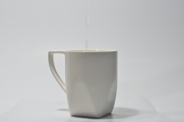A white mug on a white isolated background