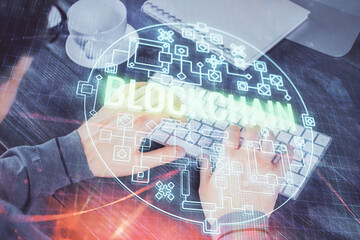 Blockchain theme hud with businessman working on computer on background. Concept of crypto chain. Multi exposure.
