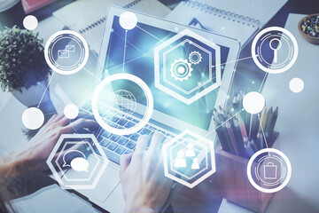 Media network theme hologram with man working on computer on background. Concept of internet communication. Double exposure.