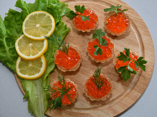Tartlets with red caviar