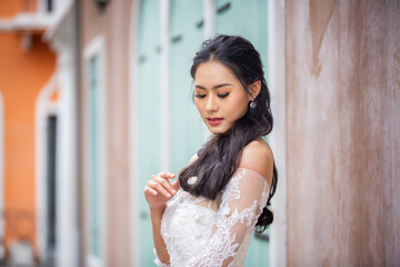 Fototapeta premium young woman in a wedding dress