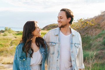 Beautiful happy young couple in love spending time together