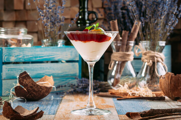 Sweet cherry jam dessert with cream martini glass 