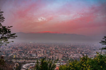 Santiago de Chile city at dusk with Andes
