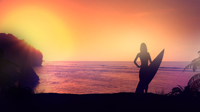 Girl with a surfboard on a sunset background.