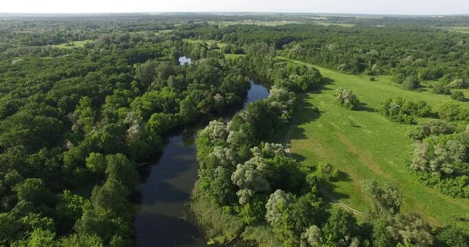 Aerial view to summer forest and river bend of Seversky Donets