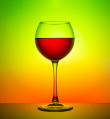 glass wine glass close-up on a color gradient background