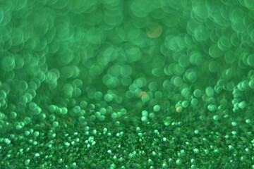 Blurred green color pattern. Colorful abstract bokeh texture. Defocused background