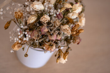 Puget of Dried Flowers in White Pot