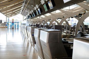 Obraz premium Row of empty check-in desks in international airport