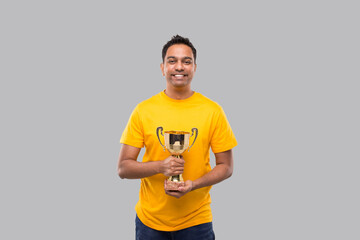 Indian Man Holding Trophy in Hands Isolated Smilling