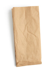 empty paper disposable bag of brown kraft paper isolated on white background, concept of rejection of plastic packaging