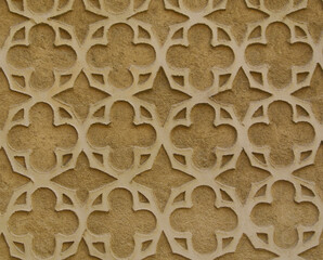 Gothic ornament made of gypsum on stone wall in Segovia, Spain