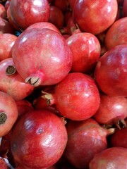 Fototapeta na wymiar red pomegranate displayed in the market ,uae .