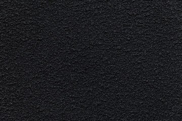 Black cement wall texture and seamless background. Dark wall with copy space.