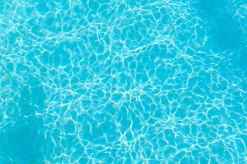 beautiful clear pool water reflecting in the sun. Beautiful refreshing blue swimming pool water