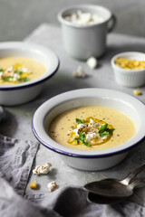 Vegan corn soup with popcorn 