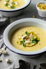 Vegan corn soup with popcorn 