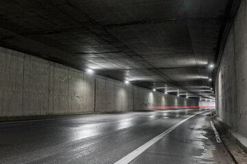 Obraz premium Highway tunnel. Interior of an urban tunnel without traffic.