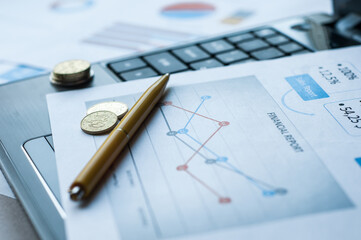 Book bank saving deposit account isolated on white. Saving account bookbank statement calculator and thai currency coins and pen. Financial bookkeeping, Accountancy Concept. Top view.