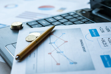 Book bank saving deposit account isolated on white. Saving account bookbank statement calculator and thai currency coins and pen. Financial bookkeeping, Accountancy Concept. Top view.