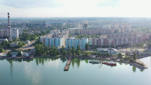 port tower crane. Cargo river port. Tower crane on the river. Town. Sand. Summer. Cherkasy city.