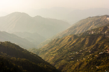 Cascading green hills in the Himalayan town of Shimla