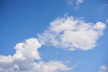 Naklejka na ściany i meble Blue sky with white fluffy cloud summer sunny day