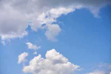 Blue sky with white fluffy cloud summer sunny day