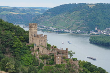 Fototapeta na wymiar High up on the mountain view onto the castle Sooneck and the River Rhone 