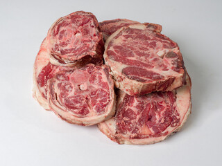 Obraz premium Slices of fresh raw mutton meat. Parts of the neck. Ingredients for cooking