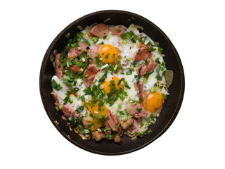 Homemade fried eggs with sausage and herbs. Frying pan on wooden boards
