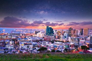 Cape Town city at night illuminated skylines and stars in the sky