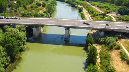 Aerial view of Marconi Bridge, in Rome, Italy. Under the bridge flows the Tiber river