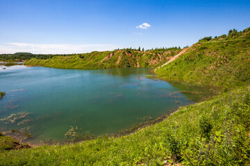 Flooded overgrown sand pit near Sychevo Volokolamsk. Russia