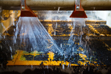 Gold mining and processing plant. Ore washing and concentrating with vibrating screen. Industrial sieve shaker. Altynalmas company, Kazakhstan.