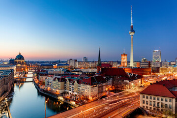 Fototapeta na wymiar Berlin sunset cityscape aerial view with tv tower and spree river