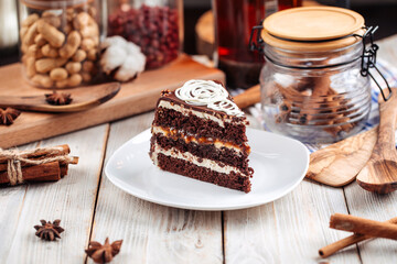 Slice of sweet chocolate sponge cake with nougat