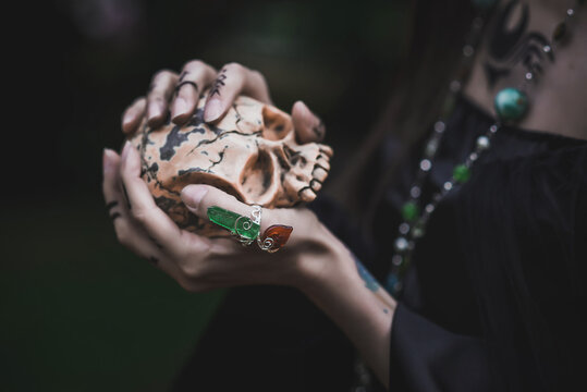 girl in a gothic gloomy image in a lilac
