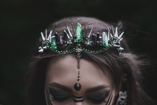 girl in a gothic gloomy image in a lilac