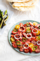 Tomato salad with shallot, green chilli and sumac