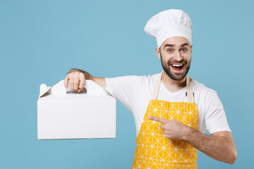 Excited bearded male chef or cook baker man in apron white t-shirt toque chefs hat isolated on blue...
