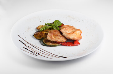Grilled turkey medallions with vegetables. For use in menu design and online delivery service. Can be used in a cookbook.