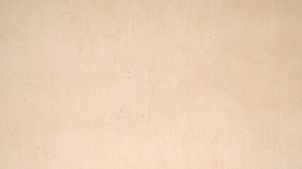 brown sand stone wall for background, concrete floor