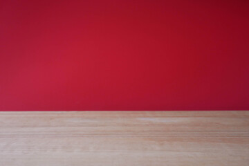 red room with wooden floor