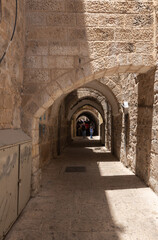 Fototapeta premium Old buildings on Al-Hakkari Street in the Arab Quarter in the old city of Jerusalem, Israel